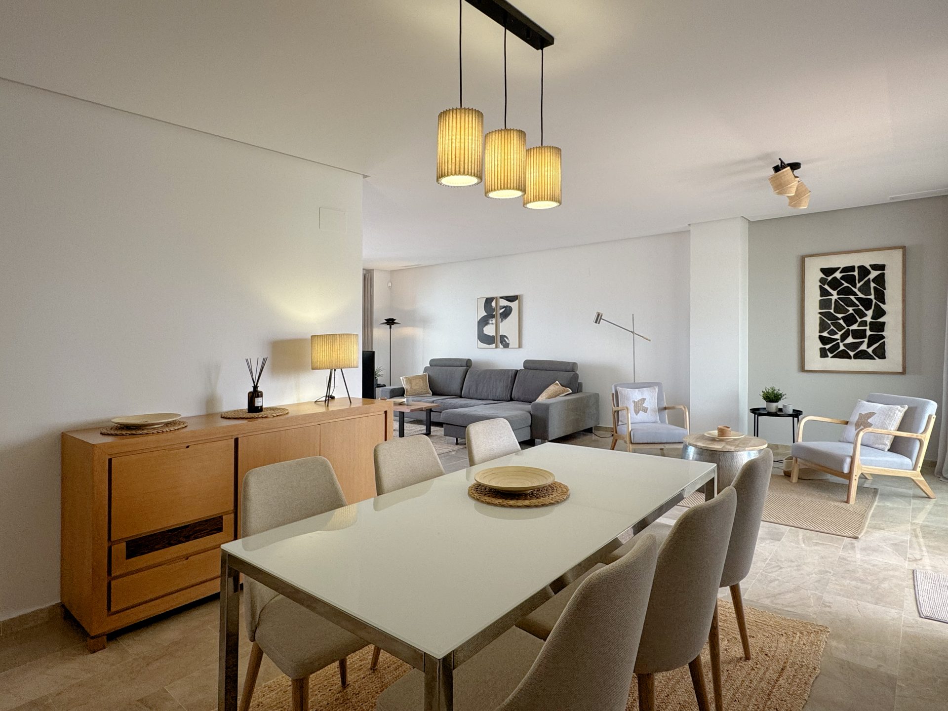 Dining beneath the pendant lights