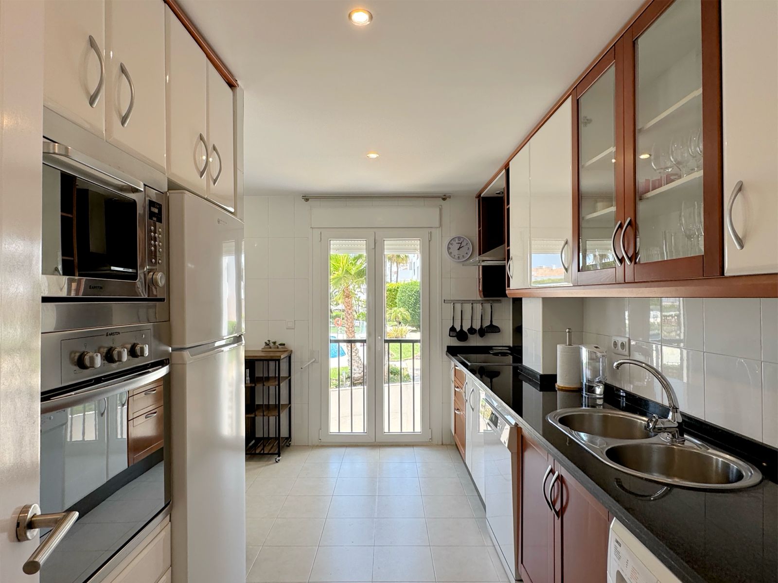 Fully fitted kitchen with garden views