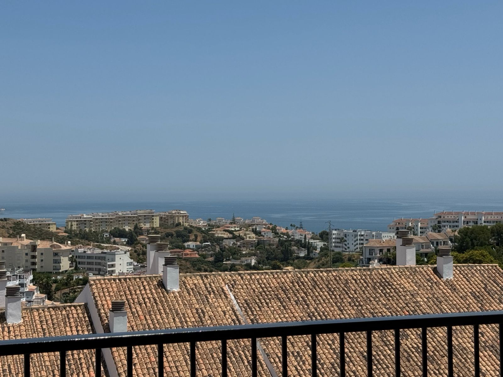 The Mediterranean over the rooftops, seen from the master bedroom's private balcony
