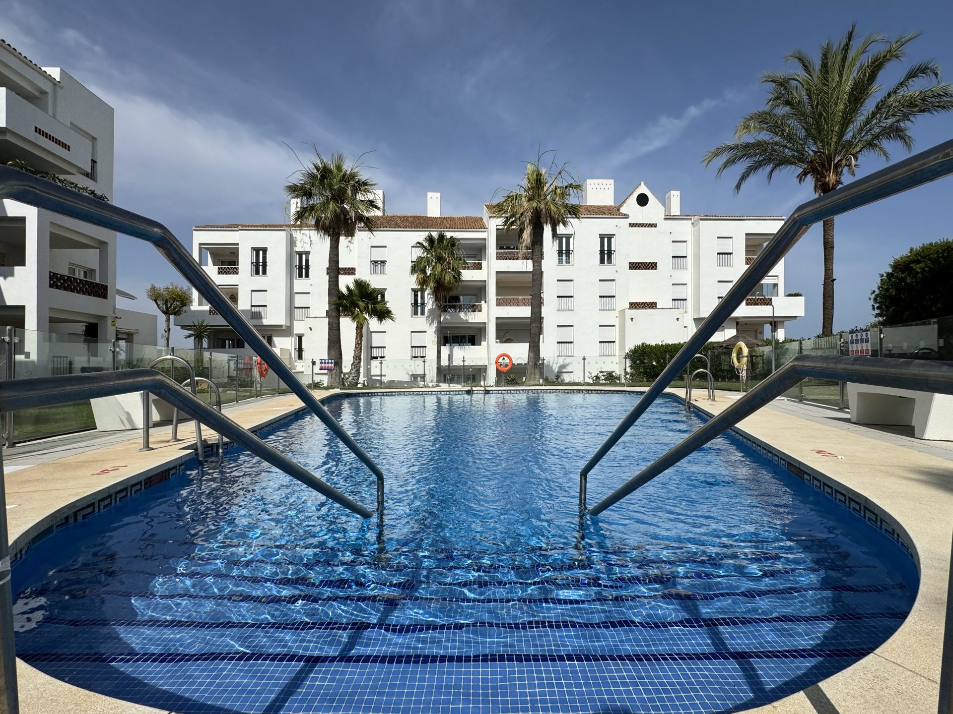 The pool and the building behind