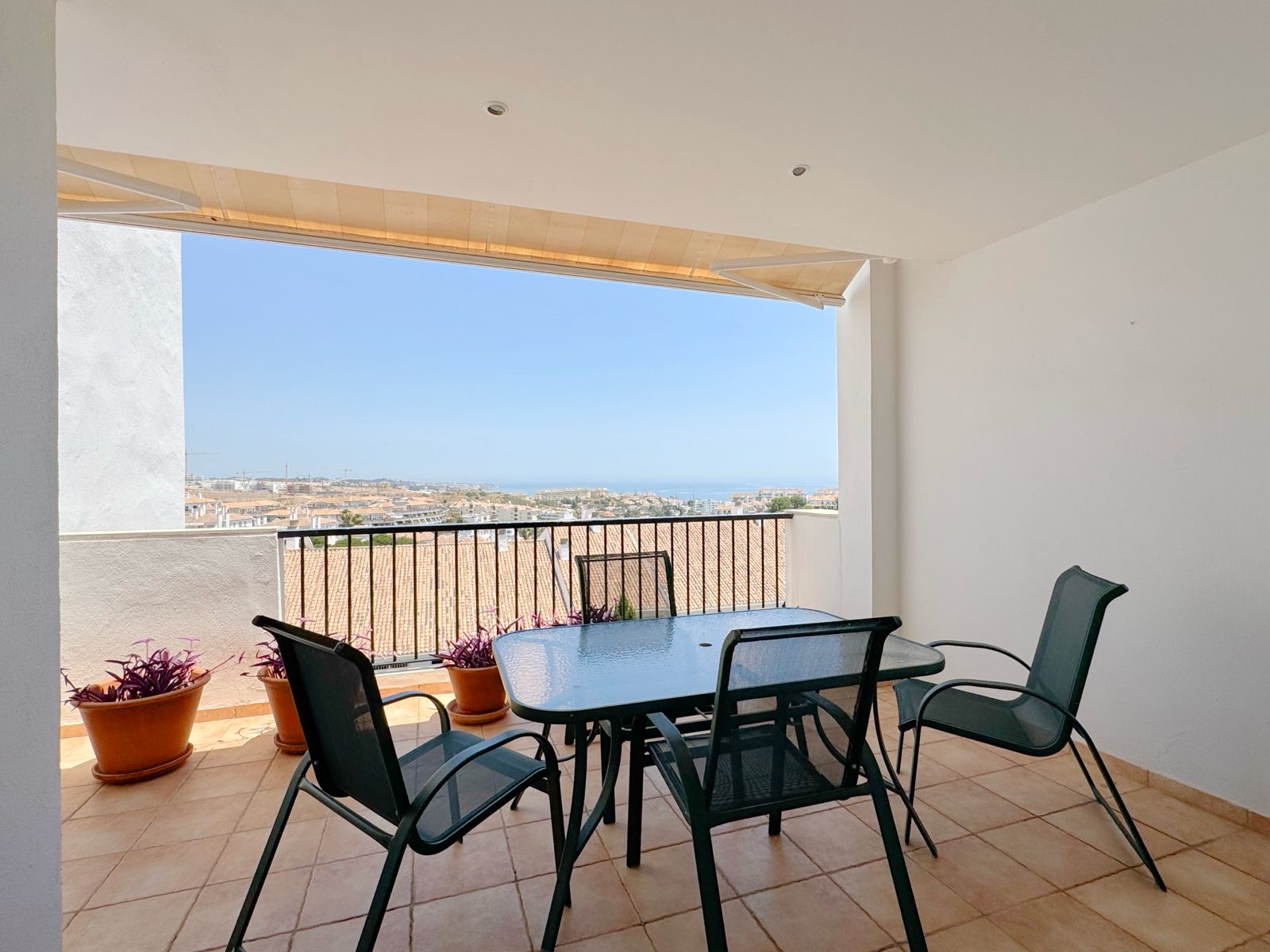 Covered terrace with sea views for alfresco dining